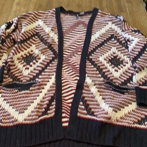 Red, blue and white cardigan